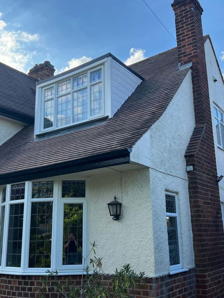 This is a photo of a dormer window which has just had some repairs carried out where the roof and the dormer meet. Works carried out by Rainworth Roofing Repairs